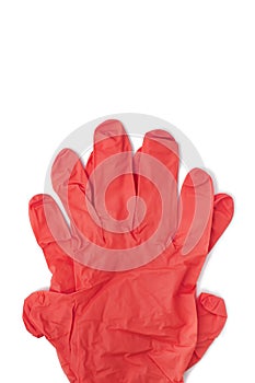 Latex red disposable gloves on white top view