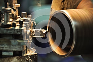 Lathe machine in a workshop, Part of the lathe. Lathe machine is operation on the work shop