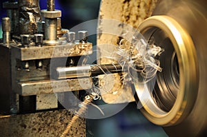 Lathe machine in a workshop, Part of the lathe. Lathe machine is operation on the work shop