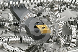 Lathe tool and turnings