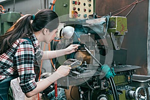 Lathe worker working at milling machine department