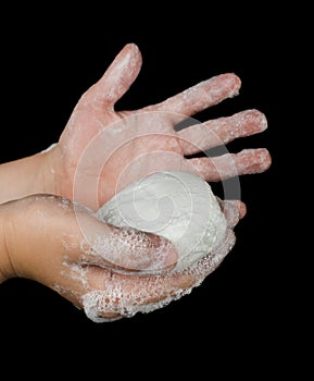 Lathered hands and soap