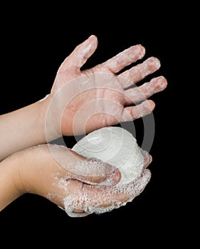 Lathered hands and soap