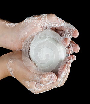 Lathered hands and soap