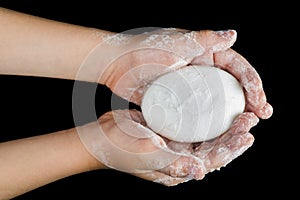 Lathered hands and soap