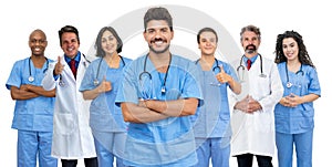 Latin american male doctor with motivated medical team