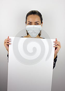 Latin American woman wearing a virus face mask