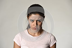 Latin angry and upset woman looking furious and crazy moody in intense anger emotion