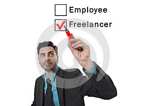 Latin attractive businessman choosing freelancer to employee option at work formular ticking box with red marker