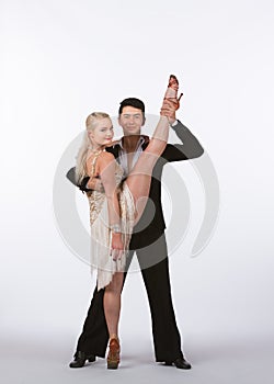 Latin Ballroom Dancers with Off-White Dress - Leg Lift