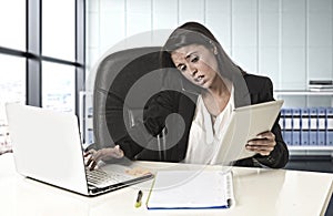 Latin business woman suffering stress working at office compute