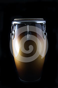 Latin Conga drum on a black Bk