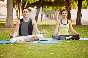 Latin couple doing some yoga