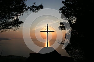 Latin cross on the sunset photo