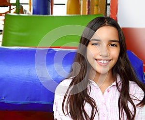 Latin indian teen girl smiling in playground