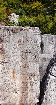 Latin inscription on tomb plate