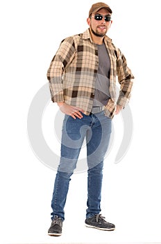 Latin man in flannel shirt cap and sunglasses photo