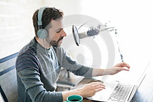 Latin man hosting online radio