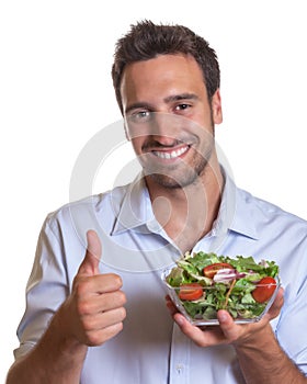 Latin man recommending fresh salad