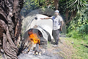 Latin man, Shaman, during shamanic, pre-Hispanic ritual, temazcal