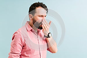 Latin man and smoker with bad hygiene