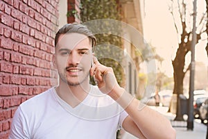 Latin man talking on the phone