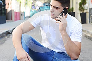 Latin man talking on the phone