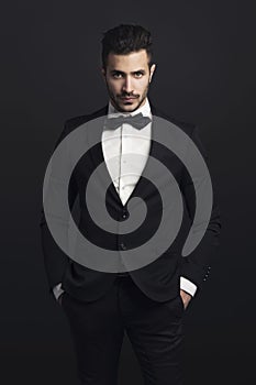 Latin man wearing a tuxedo photo