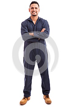 Latin mechanic wearing overalls