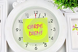 The Latin phrase Carpe Diem, a quote from Horace, means seize the moment.