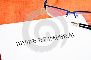 Latin quote Divide et impera meaning Divide and conquer. the best method of governing