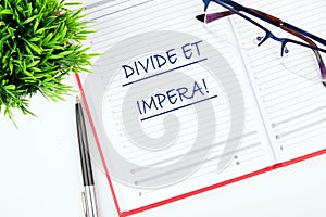 Latin quote Divide et impera meaning Divide and conquer. the best method of governing such a state is to incite and use hostility.