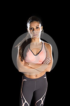 Latin sport woman posing in fierce and badass face expression with fit slim body