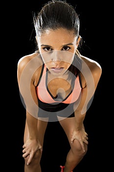 Latin sport woman posing in fierce and badass face expression with fit slim body