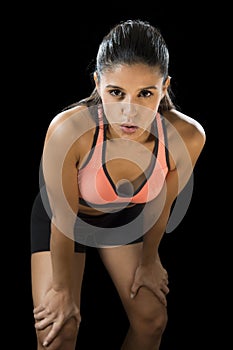 Latin sport woman posing in fierce and badass face expression with fit slim body