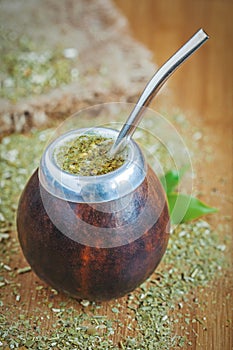 Latin traditional yerba mate tea in calabash with