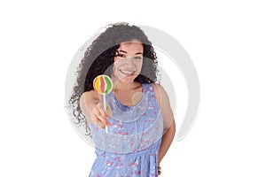 Latin woman eating lollipop.