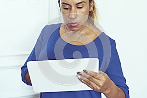 Latin woman, middle-aged preparing to go to work in the new normality