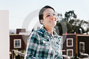 Latin woman portrait drinking coffee in a terrace in mexican house in Mexico city