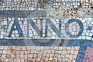 The latin word anno with mosaic stones