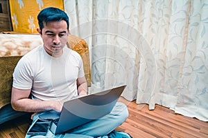 Latin young man working from home, teleworking