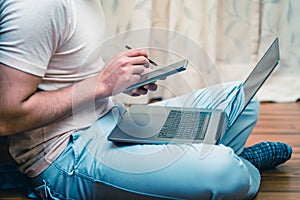 Latin young man working from home, teleworking