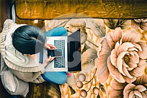 Latin young woman working from home, teleworking photo