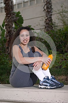 Latina with Orange Sports Water Bottle