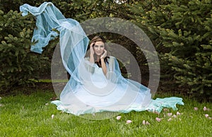 Latina woman in blue tulle