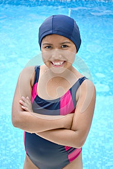 Latinamerican girl in the swimming pool.