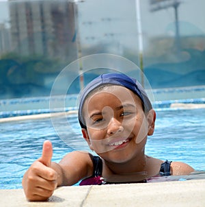 Latinamerican girl in the swimming pool.