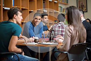 Latino American student socializing with friends