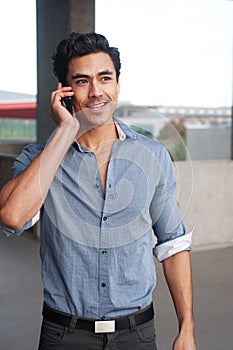 Latino businessman on phone