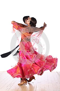 Latino dancers in ballroom